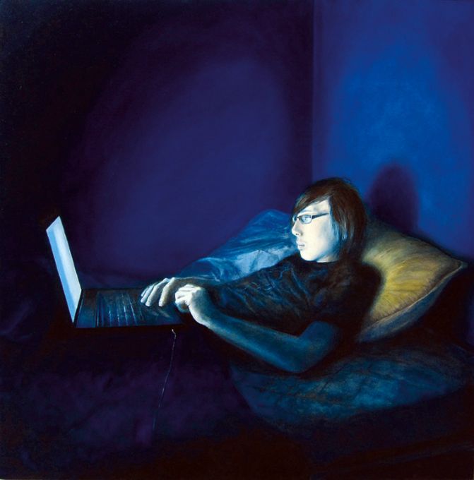 boy on laptop in the dark